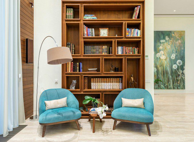 The reading corner is classically furnished