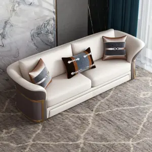 ⁦Avalin sofa and two armchair set with a luxurious modern design and elegant gold details.⁩ - الصورة ⁦7⁩