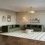 Verdi set: Two sofas with a modern design, made of natural wood and elegant gold legs.